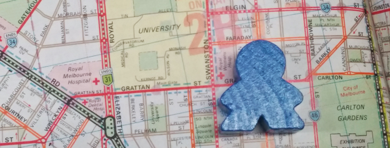 Image showing a meeple over a part of Melbourne map - Board games